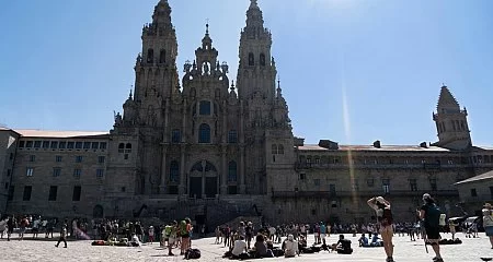 Obradoiro Square in Santiago de Compostela with visitors in front of the majestic Cathedral_334